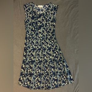Barney’s tailored blue flowered dress.